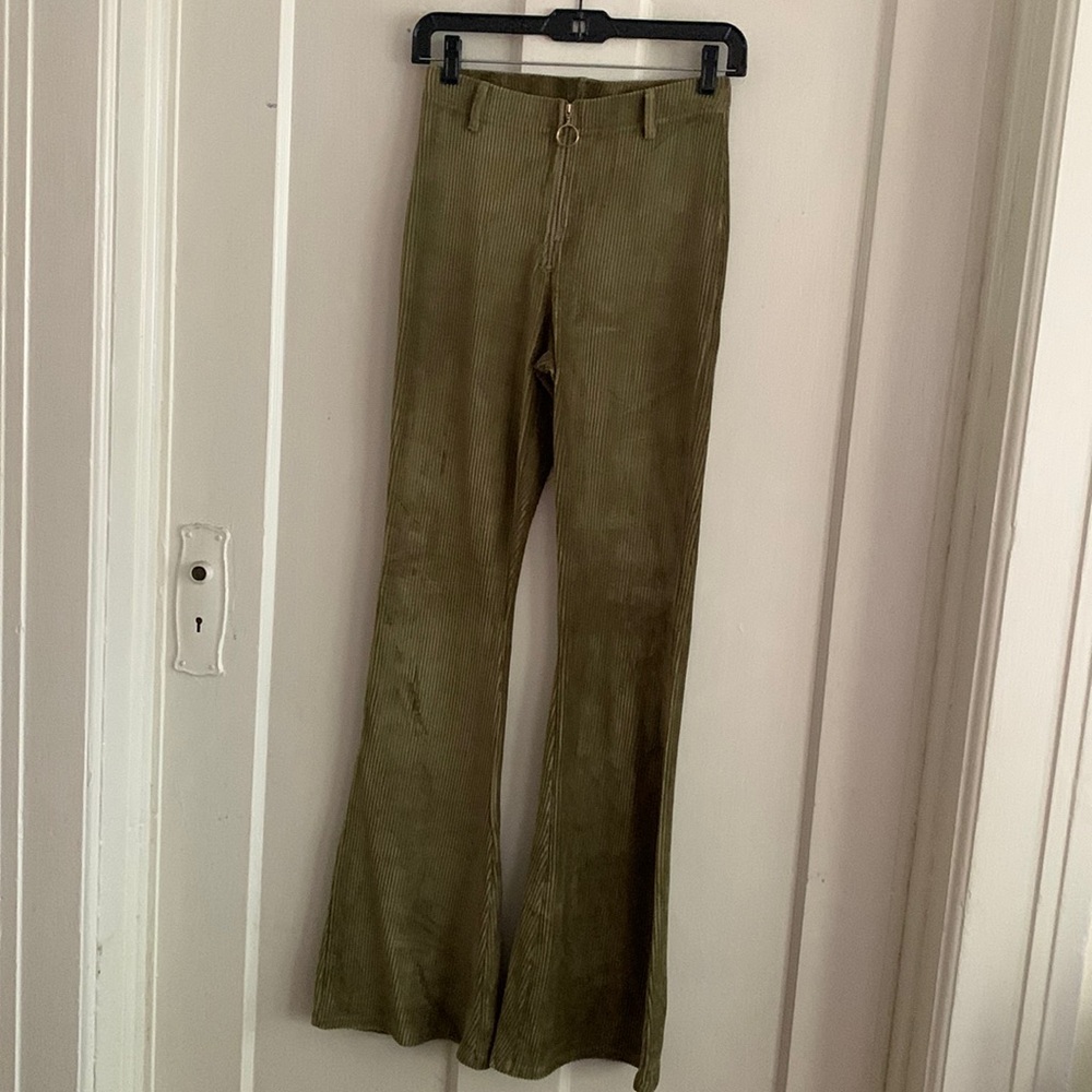 Topshop 70’s cord style bell bottoms in sage green. Size 4
